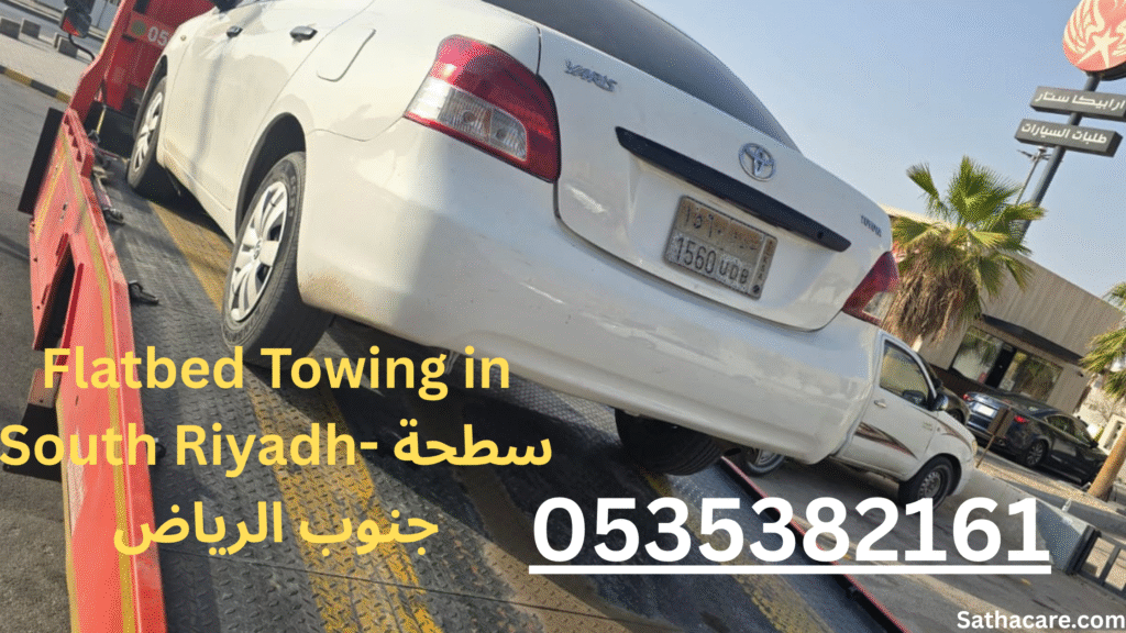 Luxury car towing by Satha Care in Al-Sulimaniyah, South Riyadh, with damage-free flatbed