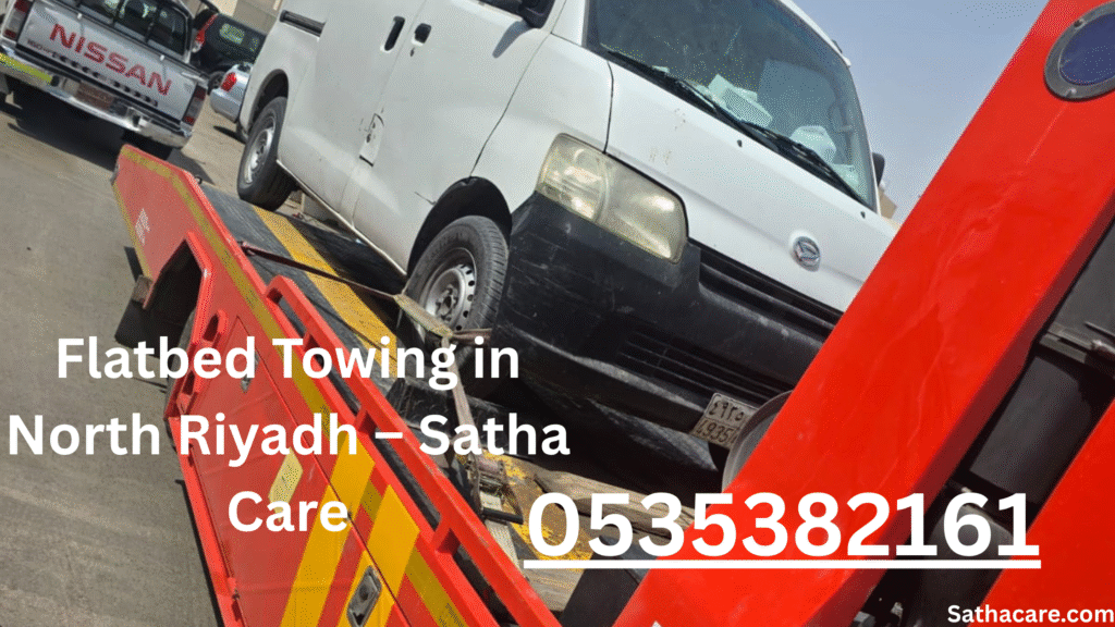 Satha Care’s low-profile flatbed towing a luxury Bentley in Al-Nakheel, North Riyadh, ensuring damage-free transport.